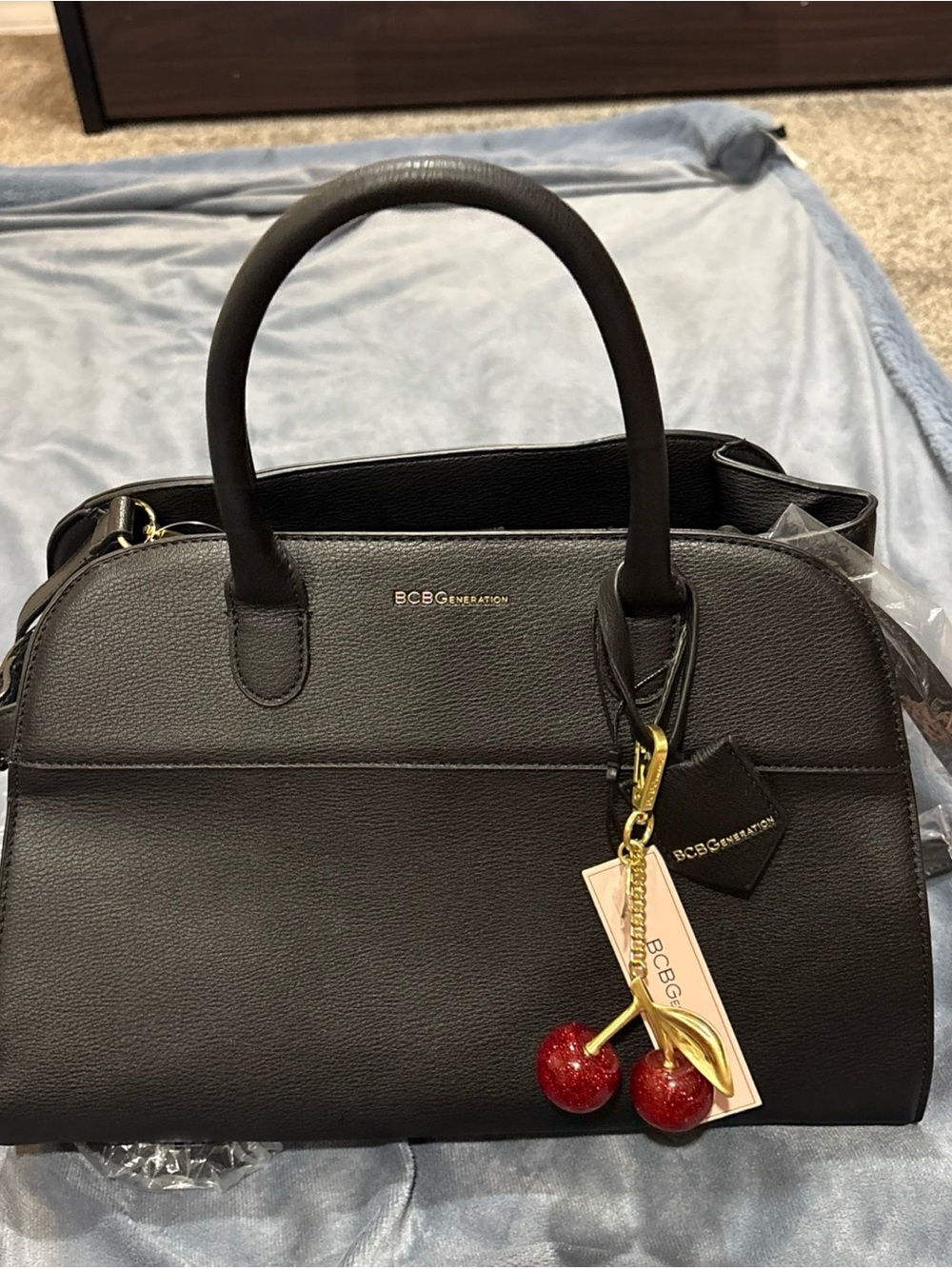 BCBGeneration Black Faux Leather Satchel with Red Cherry Charm